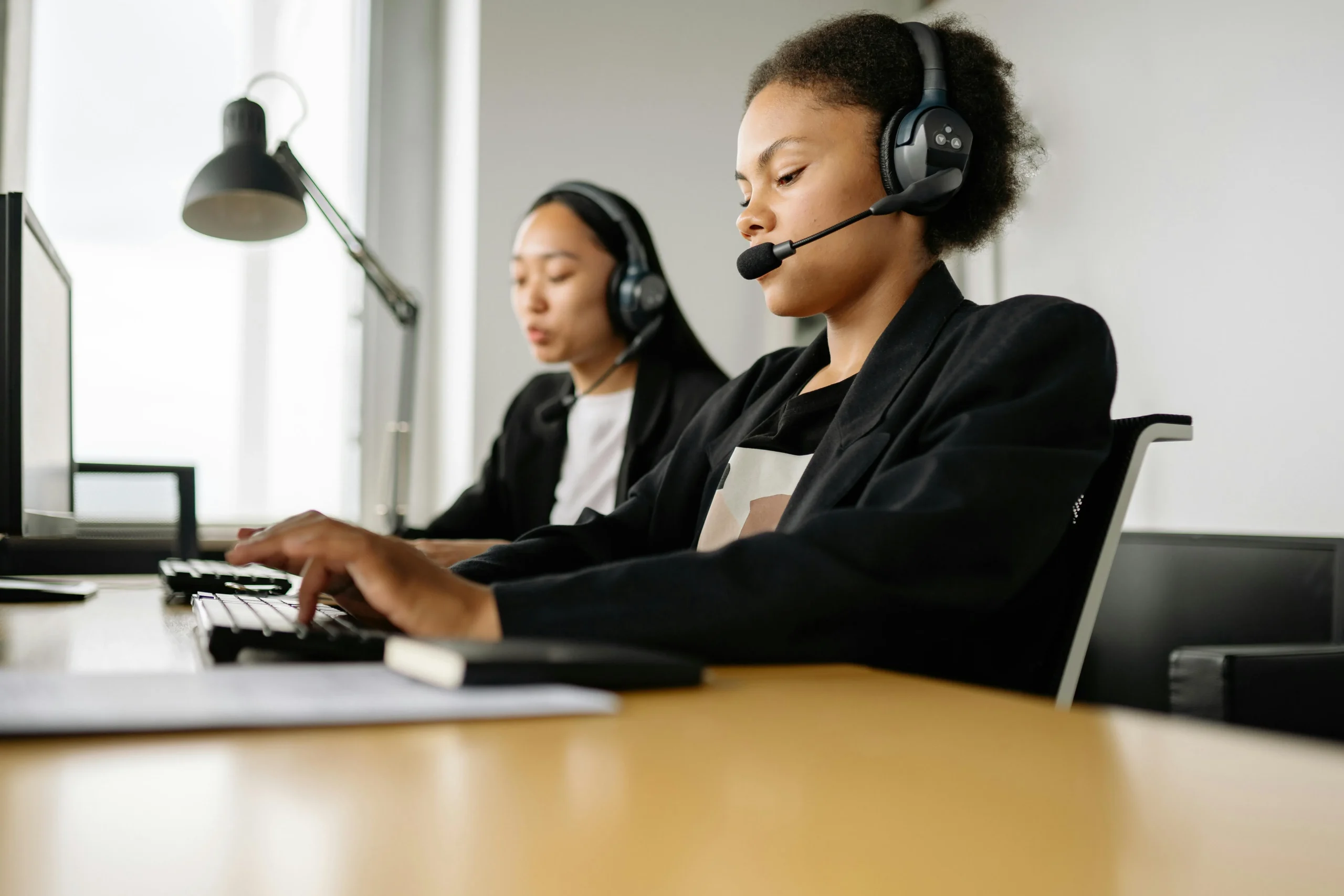 a-woman-talking-with-a-customer-on-call