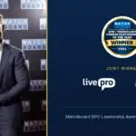 Phil Nakkan of livepro holding the BPO / Technology Vendor Partnership of the Year trophy, alongside the Matchboard BPO Leadership Awards 2026 joint winner badge for livepro and TSA Group.